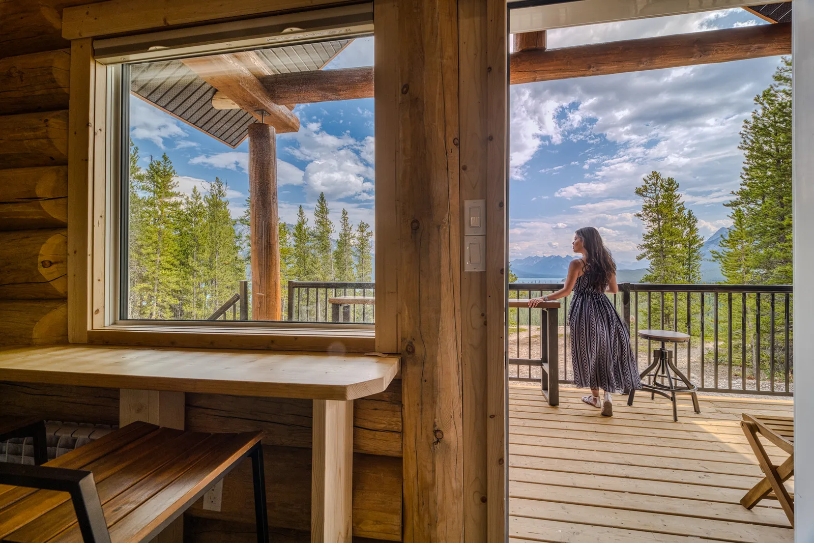 Guest enjoying the view from a private deck
